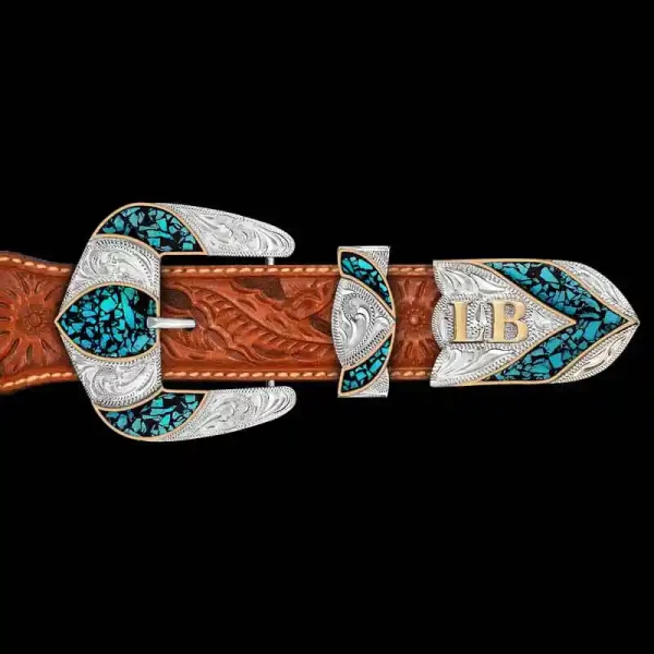 "This buckle is nothing short of stunning. Our Black Mesa  Custom 3-Piece Buckle Set is handcrafted on a German Silver base, featuring crushed stones in your choice of color, with Jeweler's Bronze borders and lettering. This buckle set is built to fi